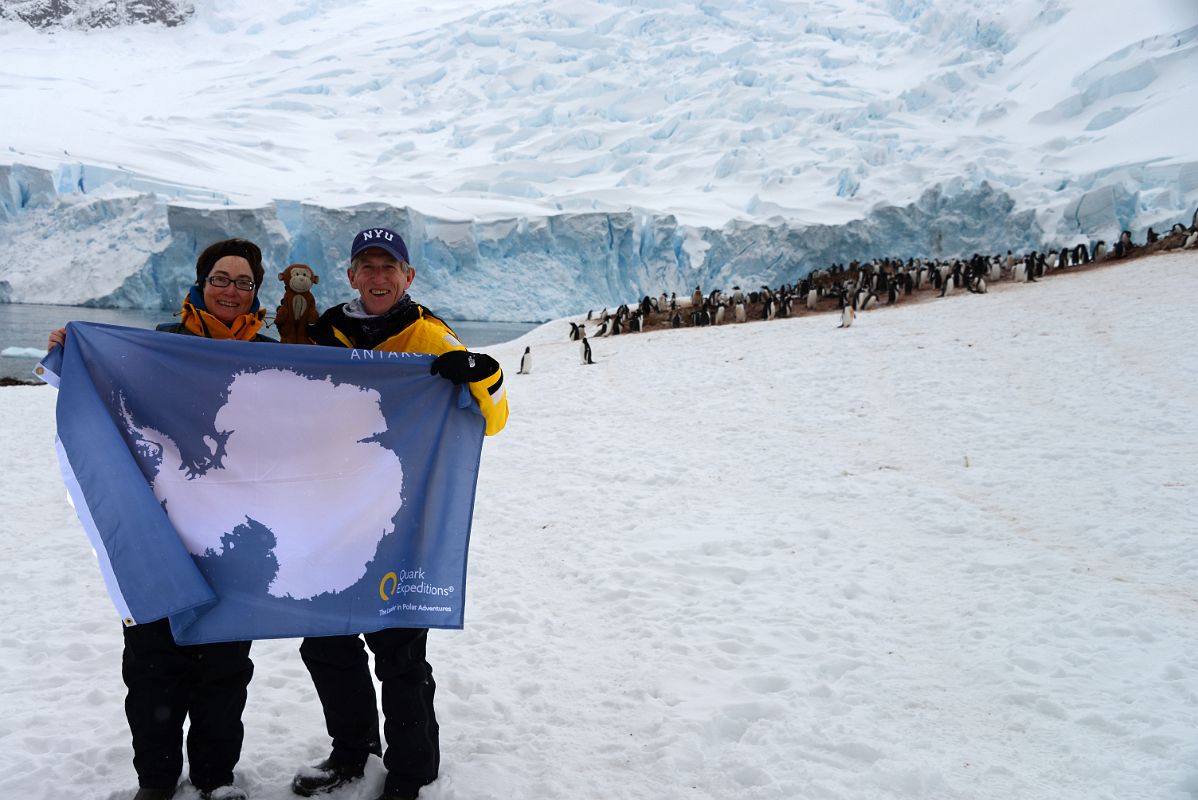 02 Charlotte Ryan, Dangles And Jerome Ryan Set Foot On The Antarctica Mainland At Neko Harbour With A Huge Glacier And Penguins Behind On Quark Expeditions Antarctica Cruise